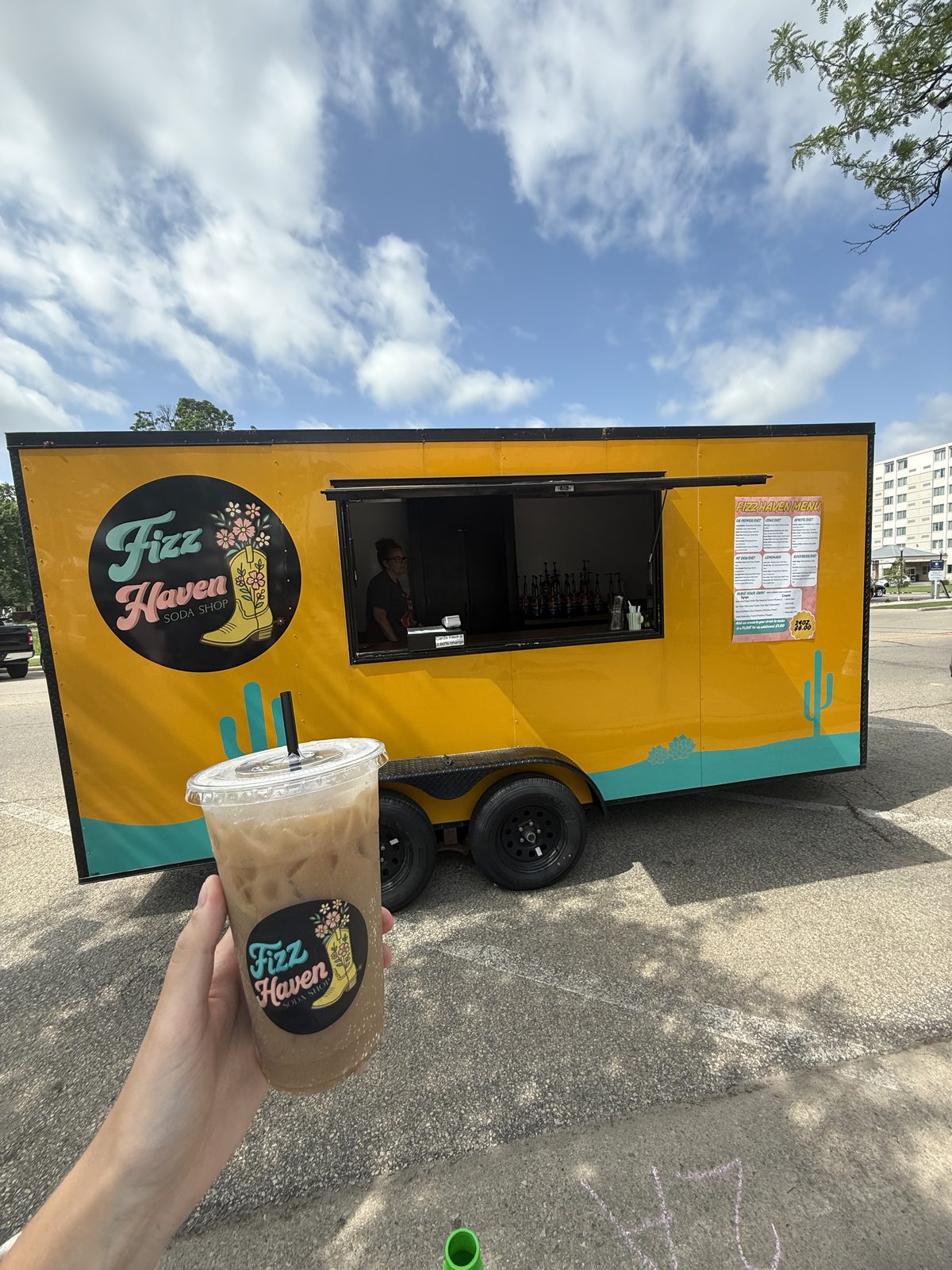 Fizz Haven yellow soda truck with a branded dirty soda